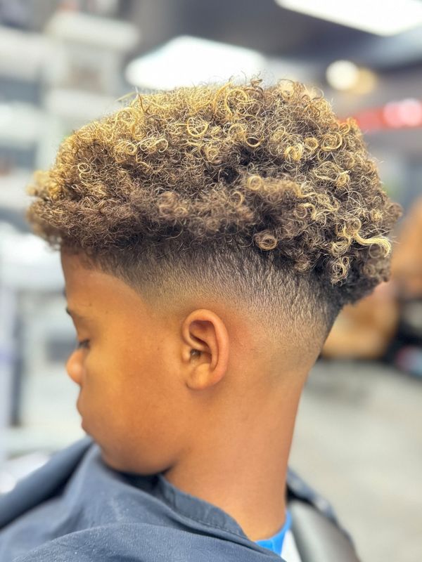 Curly top with a burst fade