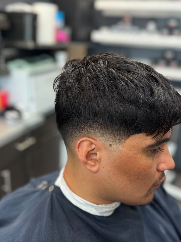 Textured fringe with a low taper
